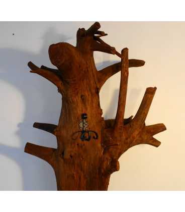 Coat stand formed of a tree trunk with metal hooks 060